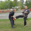 Huk kicking Ingmar for his promotion to 5th Degree Black Belt.